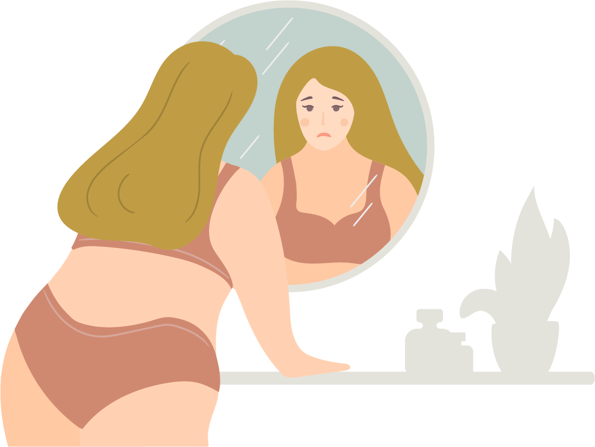 Trist dame der kigger på sig selv i spejlet